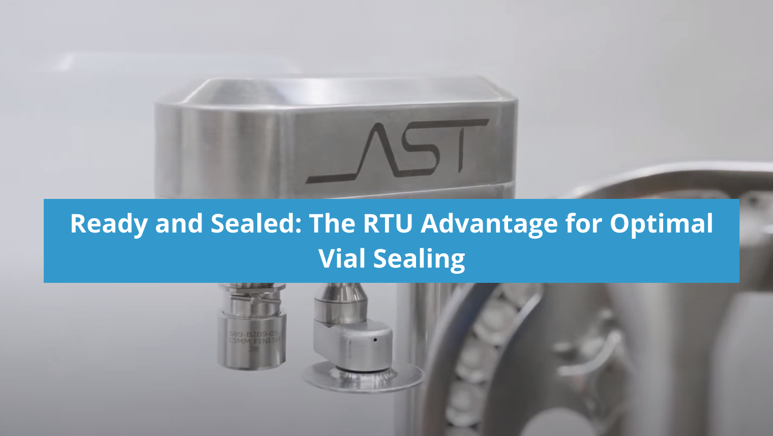 AST aseptic vial sealing robotic machinery in a life sciences cleanroom